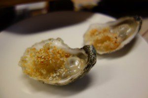 raw oyster with spicy kohlrabi kraut & sesame