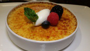 Tahitian Vanilla Creme Crulee (Tahitian vanilla custard, fresh berries, whipped cream)